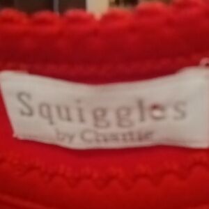 FINAL PRICE NWT Squiggles 100% red lap shoulder gown w elastic hem 0/3 mths